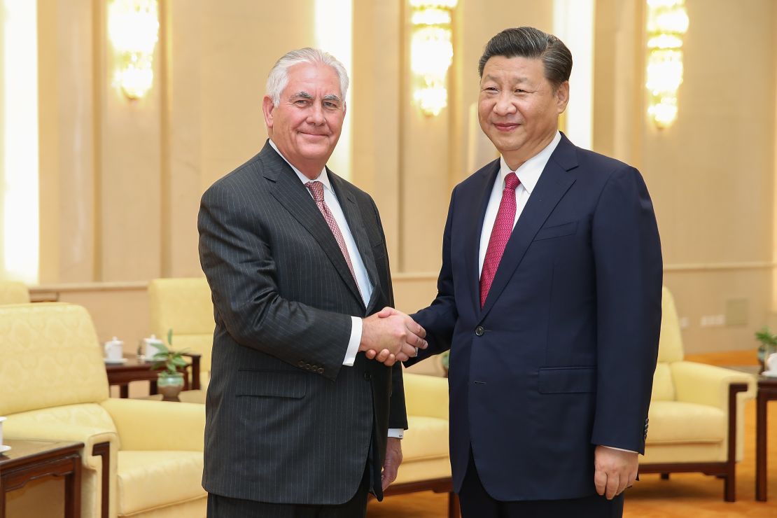 US Secretary of State Rex Tillerson shakes hands with Chinese President Xi Jinping before their meeting at the Great Hall of the People on September 30, 2017 in Beijing, China.