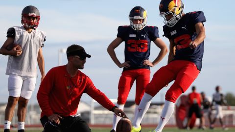 Ricciardo and Red Bull teammate Max Verstappen take part in a training session with the Del Valle Cardinals High School team