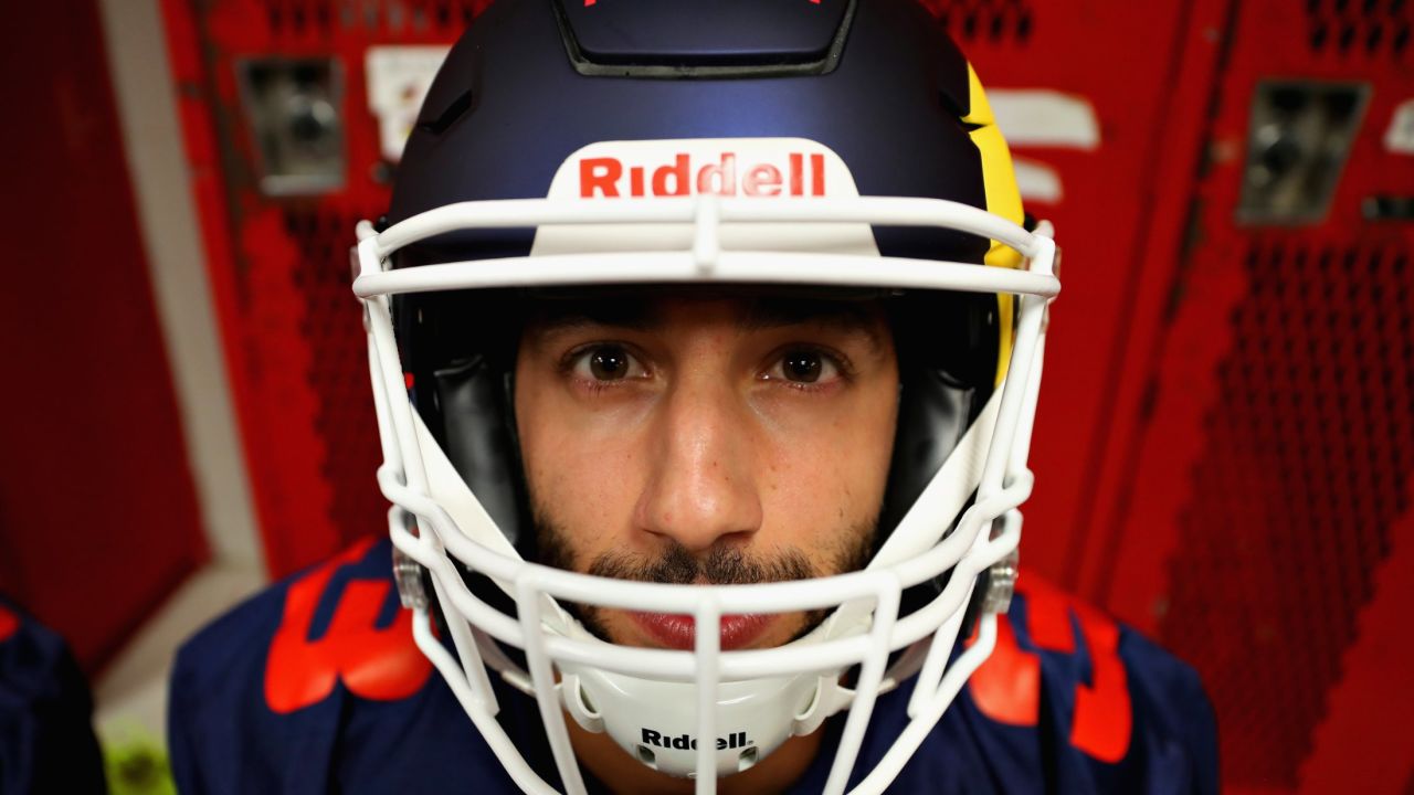 AUSTIN, TX - OCTOBER 19: Daniel Ricciardo of Australia and Red Bull Racing prepares for a training session with the Del Valle Cardinals High School Football Team during previews ahead of the United States Formula One Grand Prix at Circuit of The Americas on October 19, 2017 in Austin, Texas. (Photo by Mark Thompson/Getty Images)