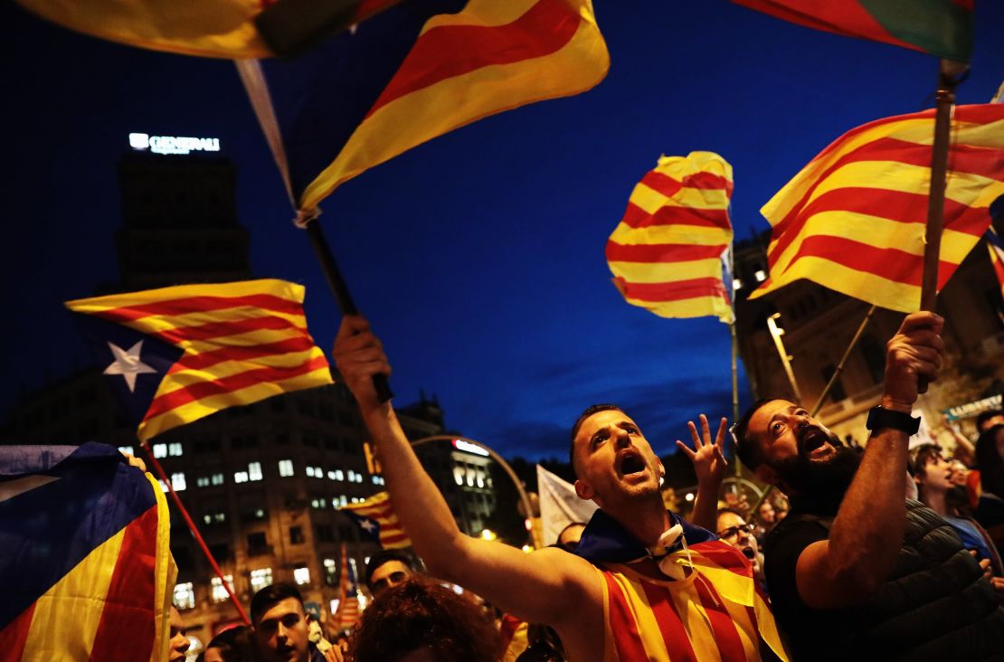 Protesters gather in Barcelona's city center on Saturday.