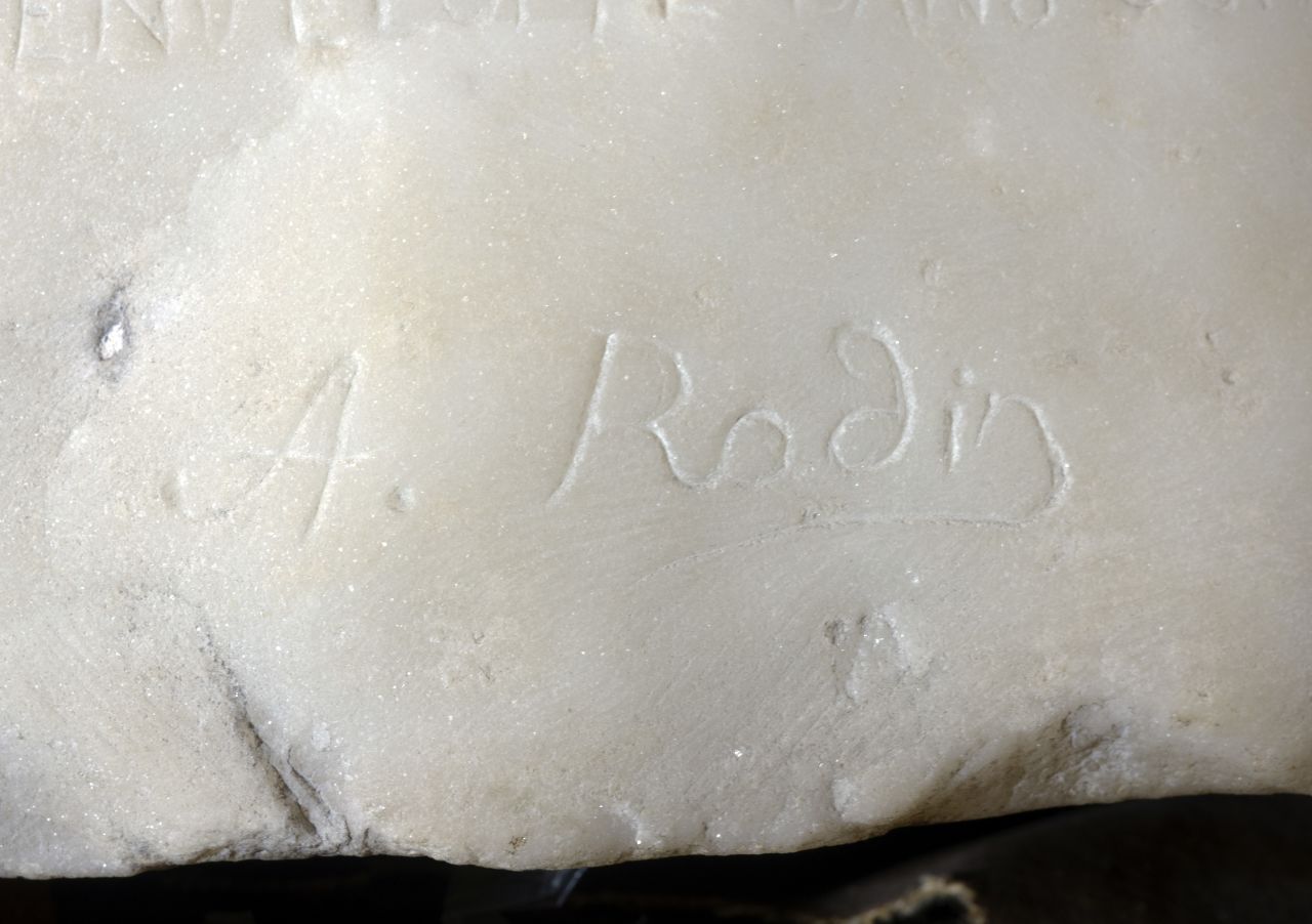 Rodin's signature is chiseled at the base.