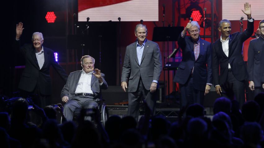 Former Presidents from right, Barack Obama, Bill Clinton, George W. Bush, George H.W. Bush and Jimmy Carter gather on stage at the opening of a hurricanes relief concert in College Station, Texas, Saturday, Oct. 21, 2017. All five living former U.S. presidents joined to support a Texas concert raising money for relief efforts from Hurricane Harvey, Irma and Maria's devastation in Texas, Florida, Puerto Rico and the U.S. Virgin Islands. (AP Photo/LM Otero)