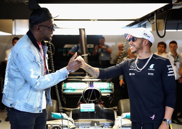 Sprinting legend Usain Bolt pays a visit to Lewis Hamilton in the Mercedes garage at the Circuit of the Americas ahead of Sunday's grand prix.