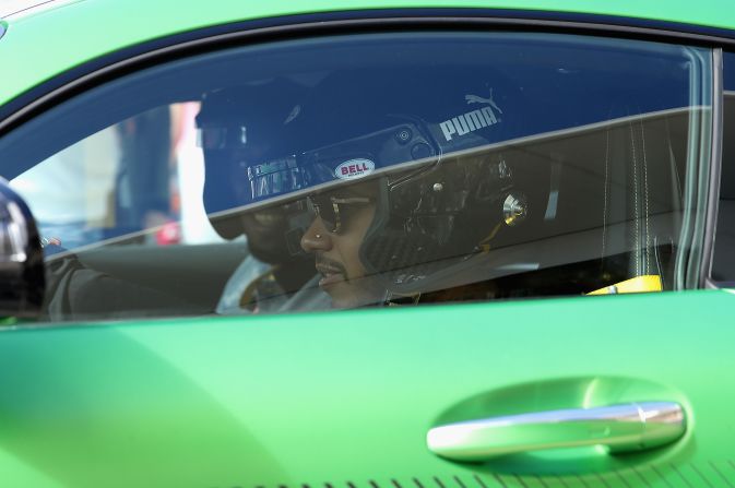 Hamilton took Bolt for a spin ahead Sunday's race...