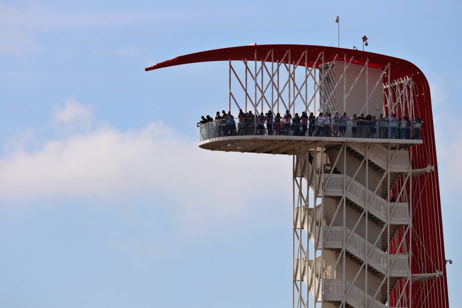 Spectators atop the observation tower at the Circuit of the Americas track. 