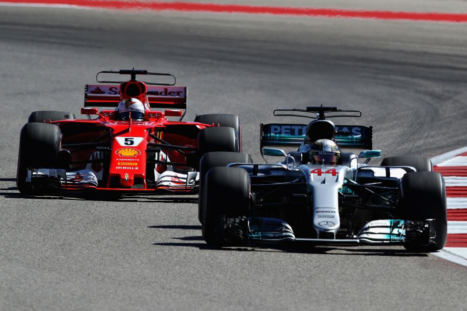 Lewis Hamilton (right) keeps Sebastian Vettel at bay during the United States Grand Prix at Austin. 