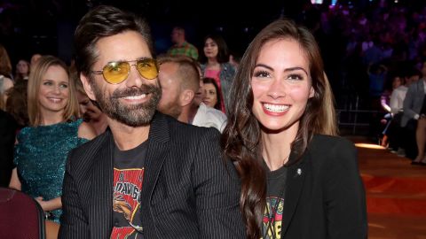 Actor John Stamos and Caitlin McHugh at Nickelodeon's 2017 Kids' Choice Awards on March 11, 2017, in Los Angeles, California.