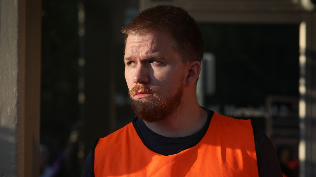 Emory Williamson volunteers as a patient escort outside the EMW Women's Surgical Center.