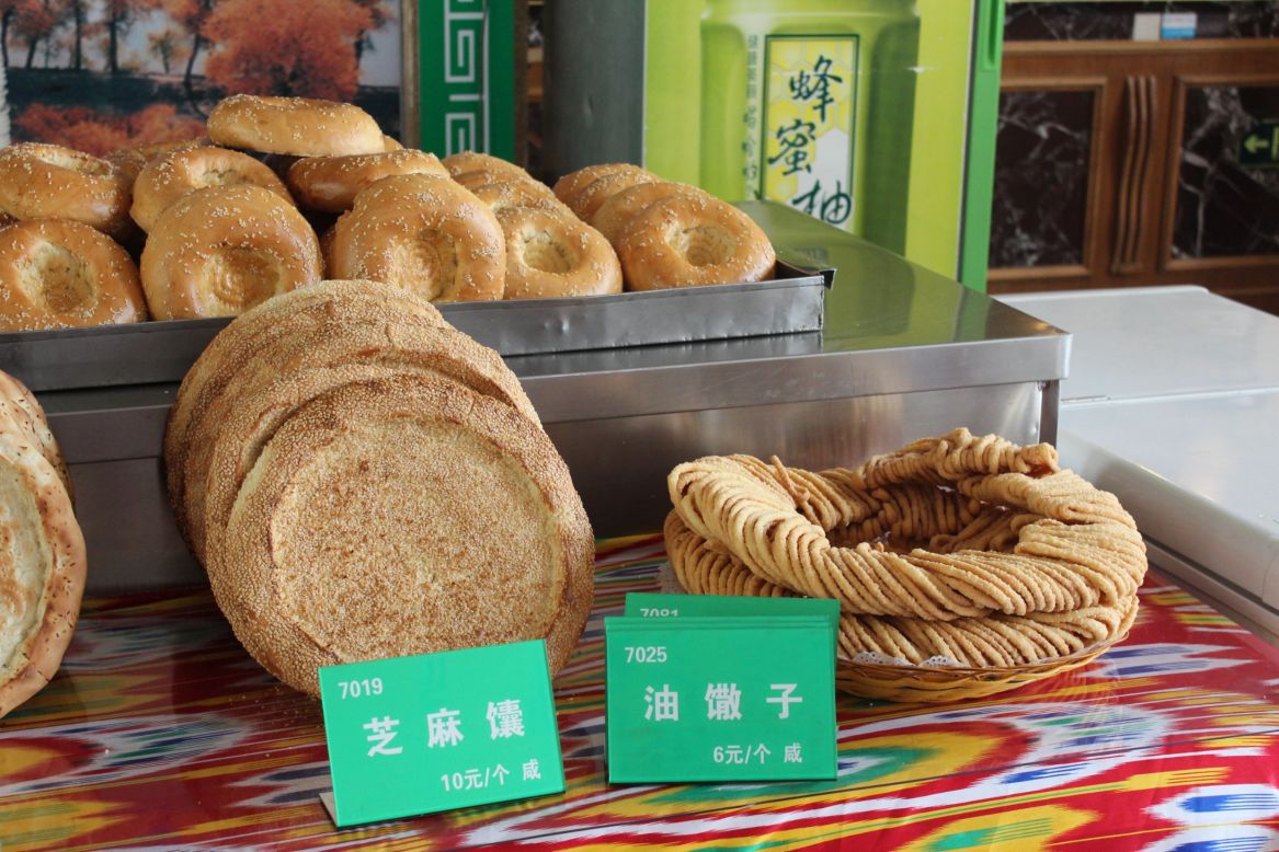 <strong>Xinjiang Islam Restaurant: </strong>Wheels of nan and other breads are on offer at the Xinjiang Islam Restaurant in Beijing. 