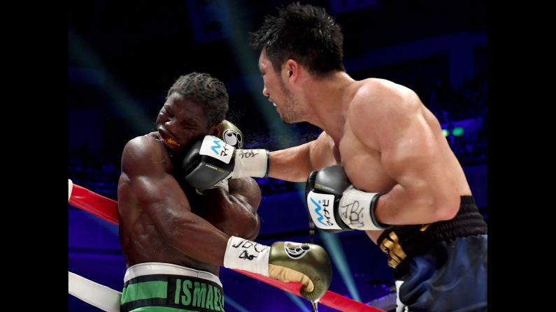 Ryota Murata punches Hassan N'Dam during their middleweight title fight in Tokyo on Sunday, October 22. Murata won the WBA belt when the fight was stopped after the seventh round.