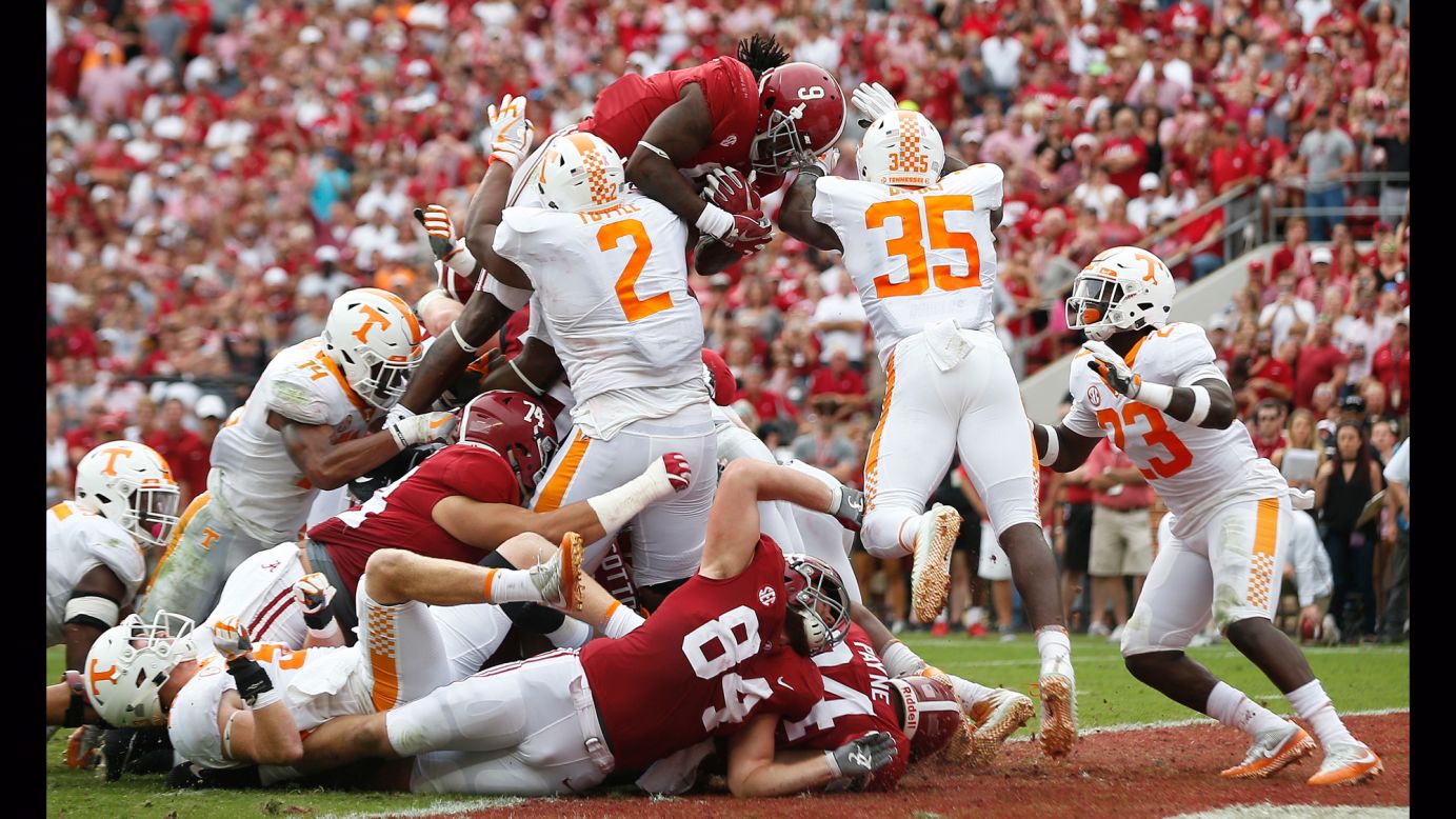 Alabama running back Bo Scarbrough leaps over the goal line to score a touchdown against Tennessee on Saturday, October 21. Scarbrough scored two touchdowns in the Crimson Tide's 45-7 victory.