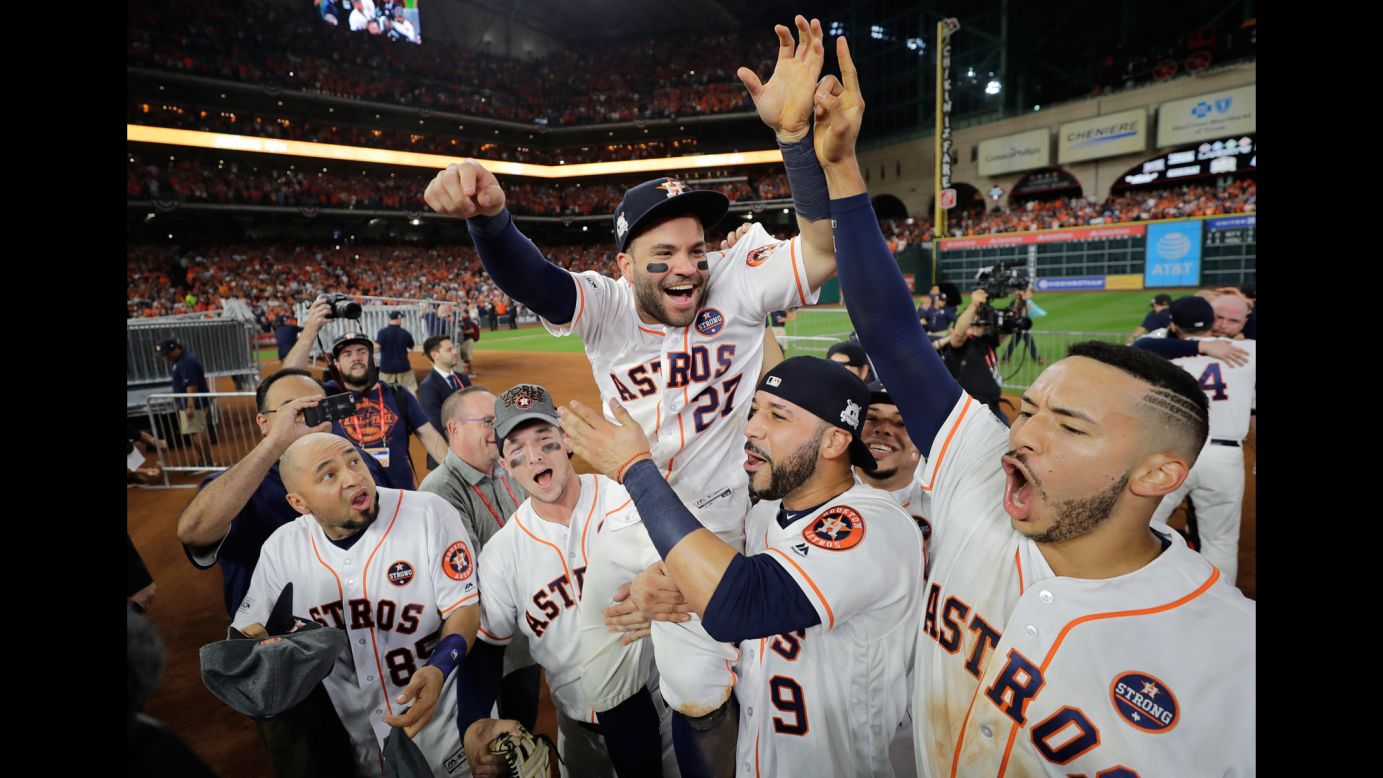 Jose Altuve is carried by some of his Houston Astros teammates after they won Game 7 of the American League Championship Series on Saturday, October 21. Altuve had a solo home run in the Astros' 4-0 victory over the New York Yankees, and Houston will face the Los Angeles Dodgers in the World Series.