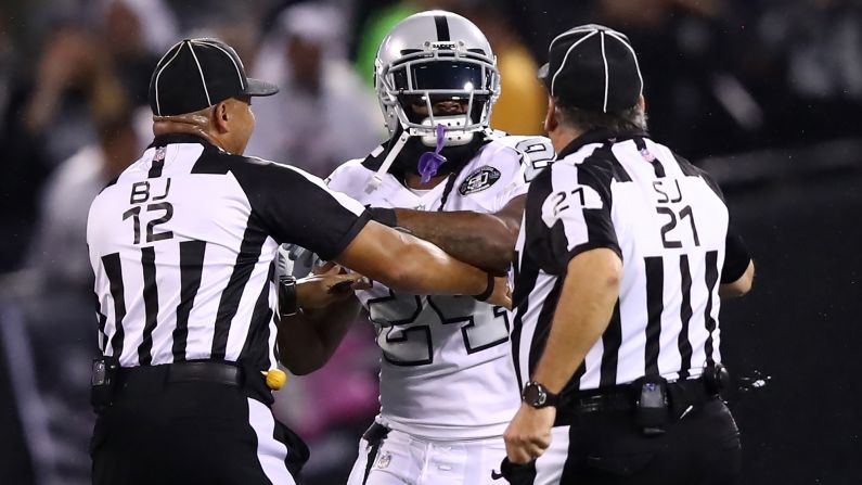Oakland running back Marshawn Lynch is restrained by officials after a scuffle broke out during the Raiders' home game against the Kansas City Chiefs on Thursday, October 19. Lynch was ejected from the game -- <a href="index.php?page=&url=https%3A%2F%2Fwww.washingtonpost.com%2Fnews%2Fearly-lead%2Fwp%2F2017%2F10%2F23%2Frivalry-be-damned-chiefs-marcus-peters-is-going-to-bat-for-marshawn-lynch-in-his-appeal-to-the-nfl%2F" target="_blank" target="_blank">and he later received a one-game suspension</a> -- for leaving the bench and making contact with an official. Lynch, who was reportedly trying to break up the scuffle between his teammates and a close friend on the Chiefs, is appealing the suspension.