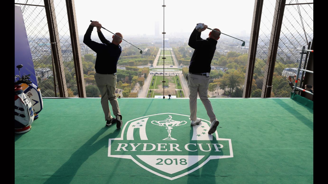 US Ryder Cup captain Jim Furyk and Europe captain Thomas Bjorn tee off from a platform on the Eiffel Tower in Paris on Tuesday, October 17. Next year's Ryder Cup will take place in France.