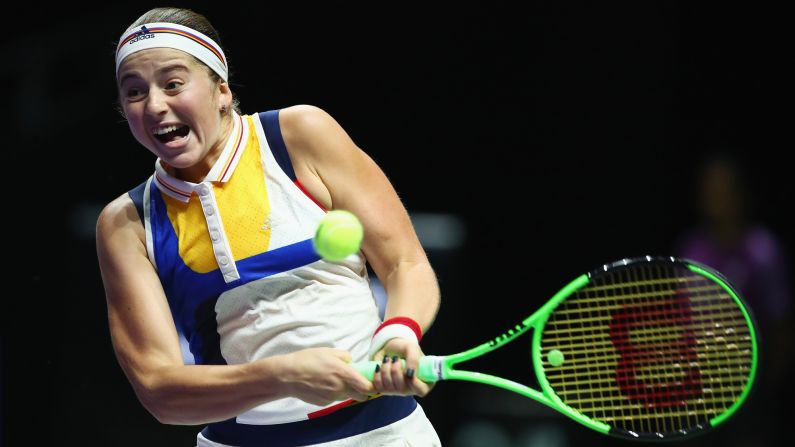 Jelena Ostapenko hits a backhand during a WTA Finals match in Singapore on Sunday, October 22.