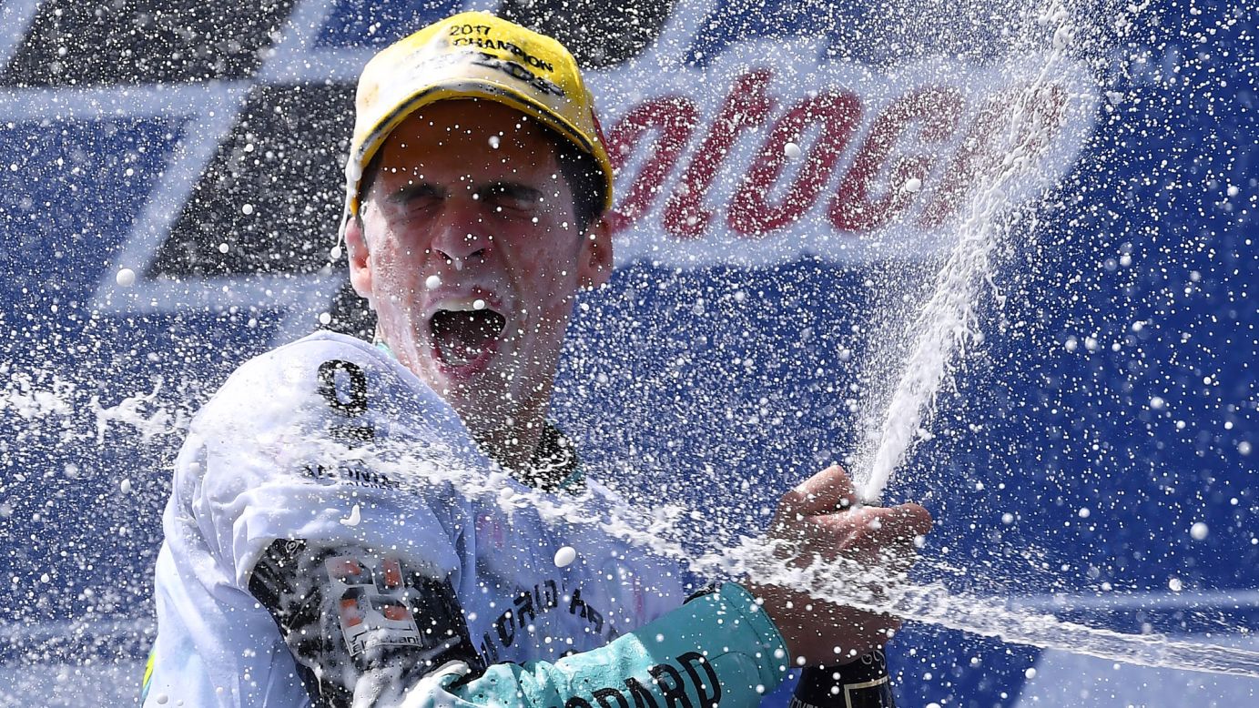 Joan Mir sprays champagne after winning the Moto3 race in Australia on Sunday, October 22. Mir's victory also clinched him the Moto3 championship.