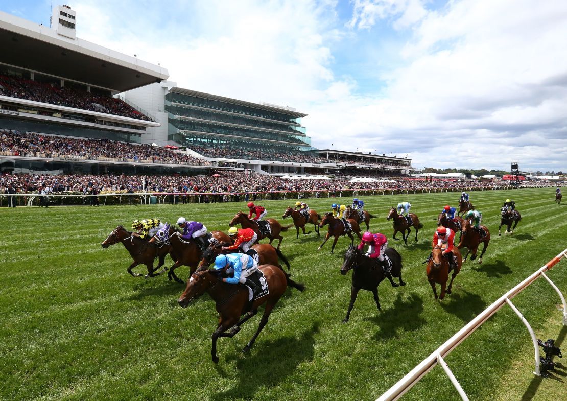 More than 100,000 fans pack into Flemington on Melbourne Cup day