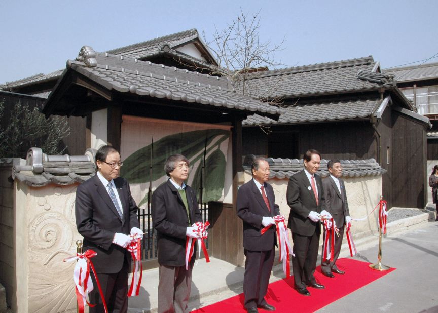 Ando cuts the tape at the opening ceremony of Ando Museum, a museum dedicated to his works, on Naoshima, in March, 2013. 