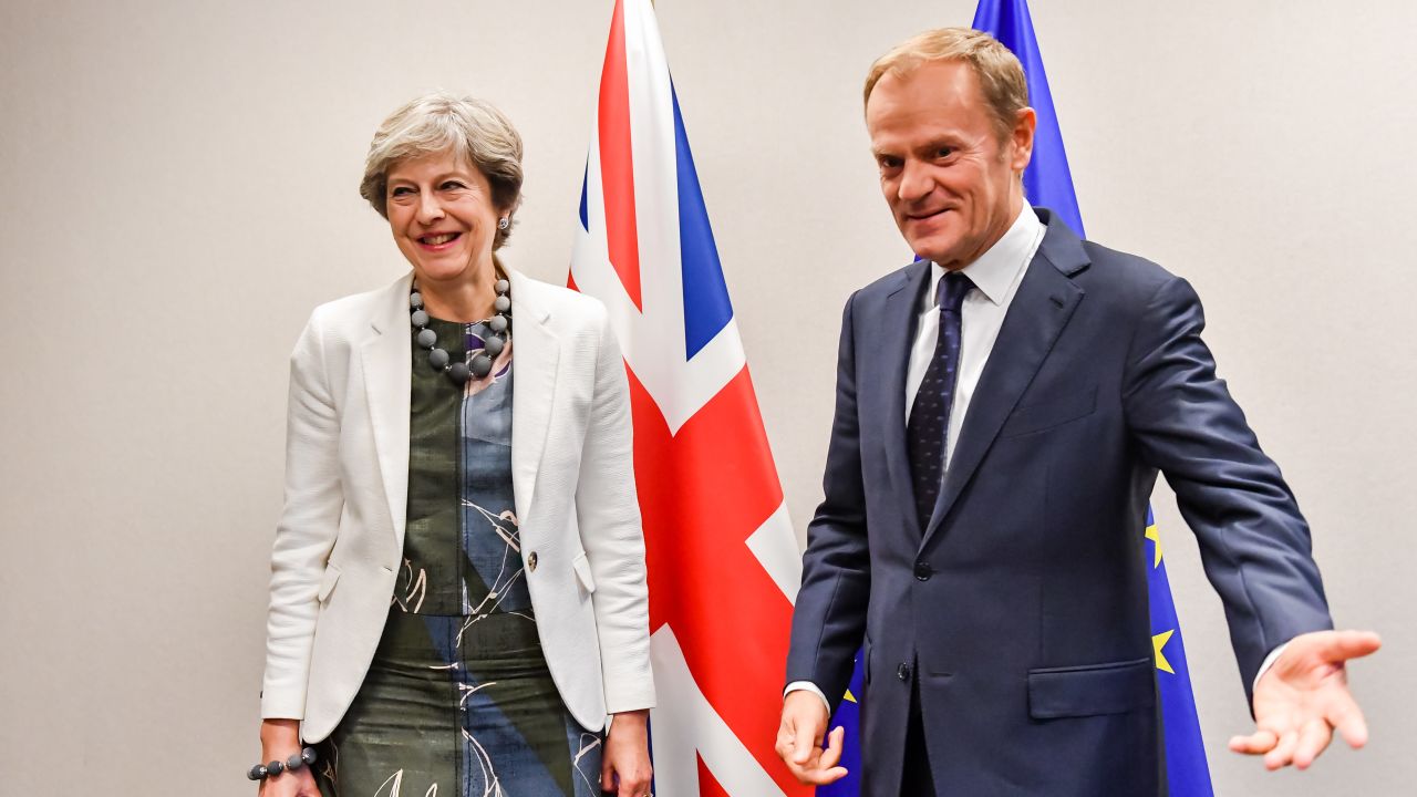 British Prime Minister Theresa May (L) is welcomed by European Council President Donald Tusk for a bilateral meeting during an EU summit in Brussels on October 20, 2017. 
The EU is expected to say that they will start internal preparatory work on a post-Brexit transition period and a future trade deal with Britain. / AFP PHOTO / POOL / Geert Vanden Wijngaert        (Photo credit should read GEERT VANDEN WIJNGAERT/AFP/Getty Images)