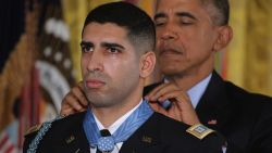 WASHINGTON, DC - NOVEMBER 12:  U.S. President Barack Obama (R) presents the Medal of Honor to retired Army Captain Florent Groberg during an East Room ceremony at the White House November 12, 2015 in Washington, DC. Born in France and a naturalized U.S. citizen, Groberg received the Medal of Honor for tackling a suicide bomber and saving fellow soldiers' lives in Afghanistan's Kunar Province in August 2012. He was also badly injured in the attack, which killed four people.  (Photo by Chip Somodevilla/Getty Images)