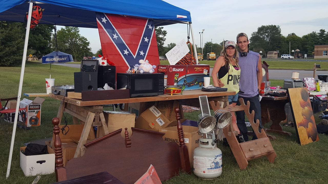 Jennifer Fink and her boyfriend JayJay Wilson sell some of Fink's belongings in Rockfield, Kentucky. (Holly Yan/CNN)