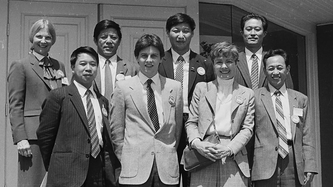 Xi -- in the back row, second from right -- poses with a group in Muscatine, Iowa, in 1985. As part of an agricultural delegation, he was making his first trip to the United States.