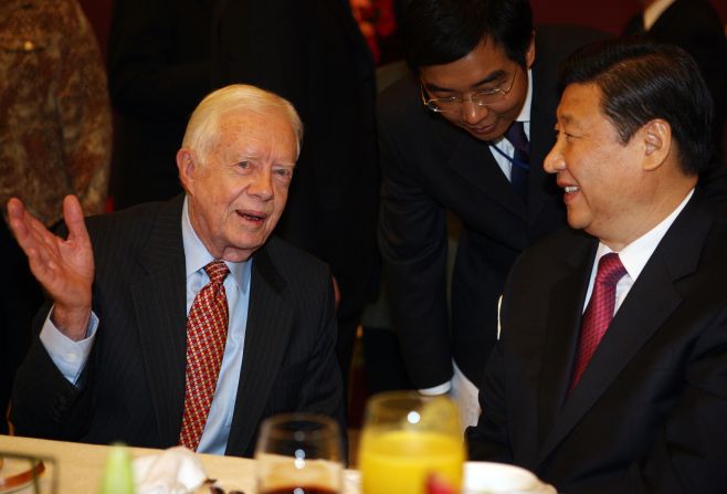Xi chats with former US President Jimmy Carter in 2009. Carter was attending a Beijing dinner that celebrated 30 years of US-China relations.