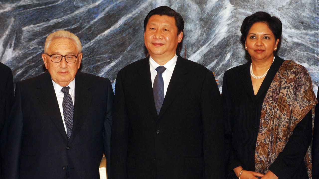 As Shanghai's party secretary in 2007, Xi welcomes former US Secretary of State Henry Kissinger and Pepsi President and CEO Indra Krishanamurthy Nooyi.