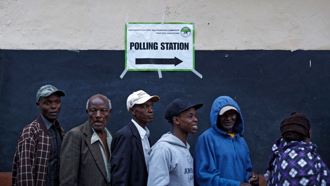 Kenyans queue to vote just after dawn on Thursday. 