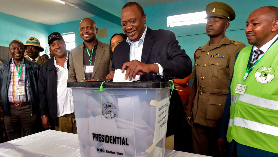 Kenya's President Uhuru Kenyatta casts his ballot.