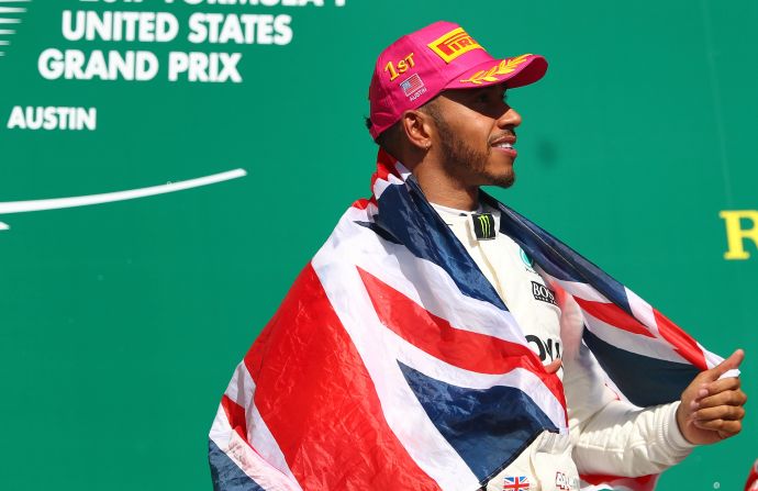 Hamilton drapes himself in the Union Jack flag at the 2017 United States Grand Prix in Austin -- after winning his fifth race in six outings. 