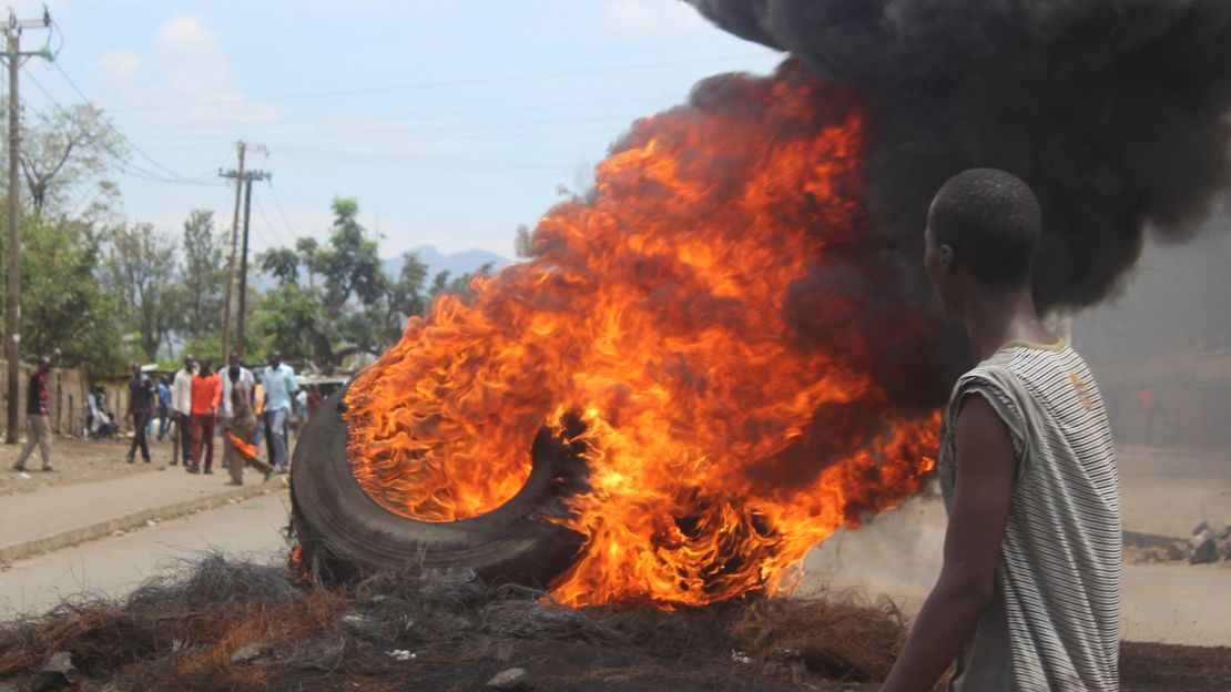 Opposition supporters burn tires during protests in Kisumu on Thursday.