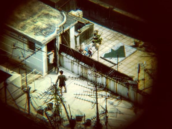 Hulse spotted a man adjusting a TV aerial from the 18th floor of a one-room apartment in Hong Kong.