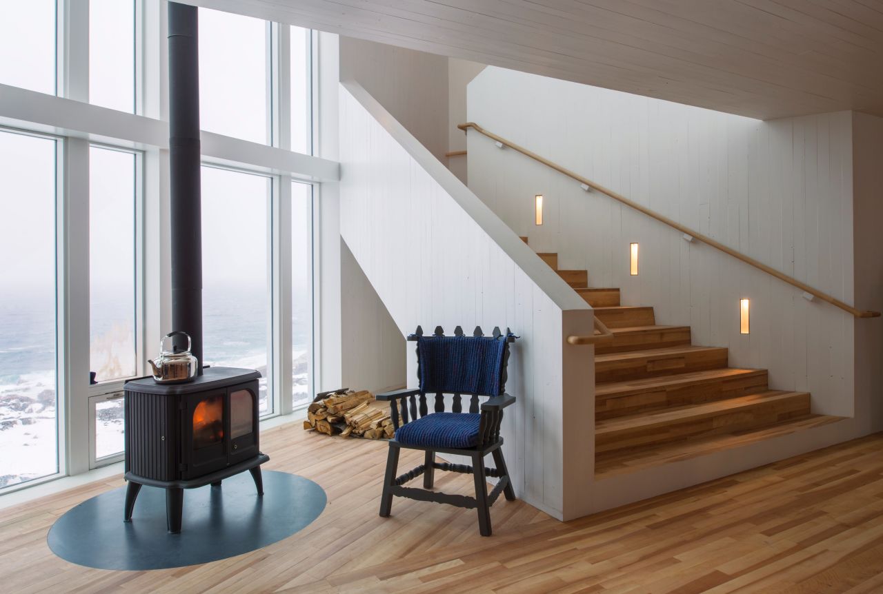 Inside the Fogo Island Inn, stark lines are softened with cozy fabrics and wooden furniture.