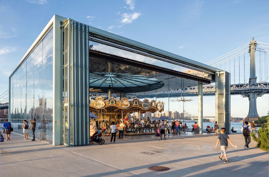 Architect Jean Nouvel was asked to build a transparent box to protect a restored 1922 carousel. During the day, the box is opened to reveal the magnificent rotating ride.