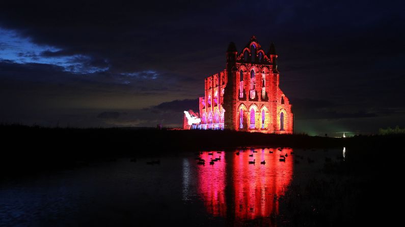 <strong>Whitby, UK:</strong> Whitby Abbey in North Yorkshire, England, is lit up to celebrate Halloween. 