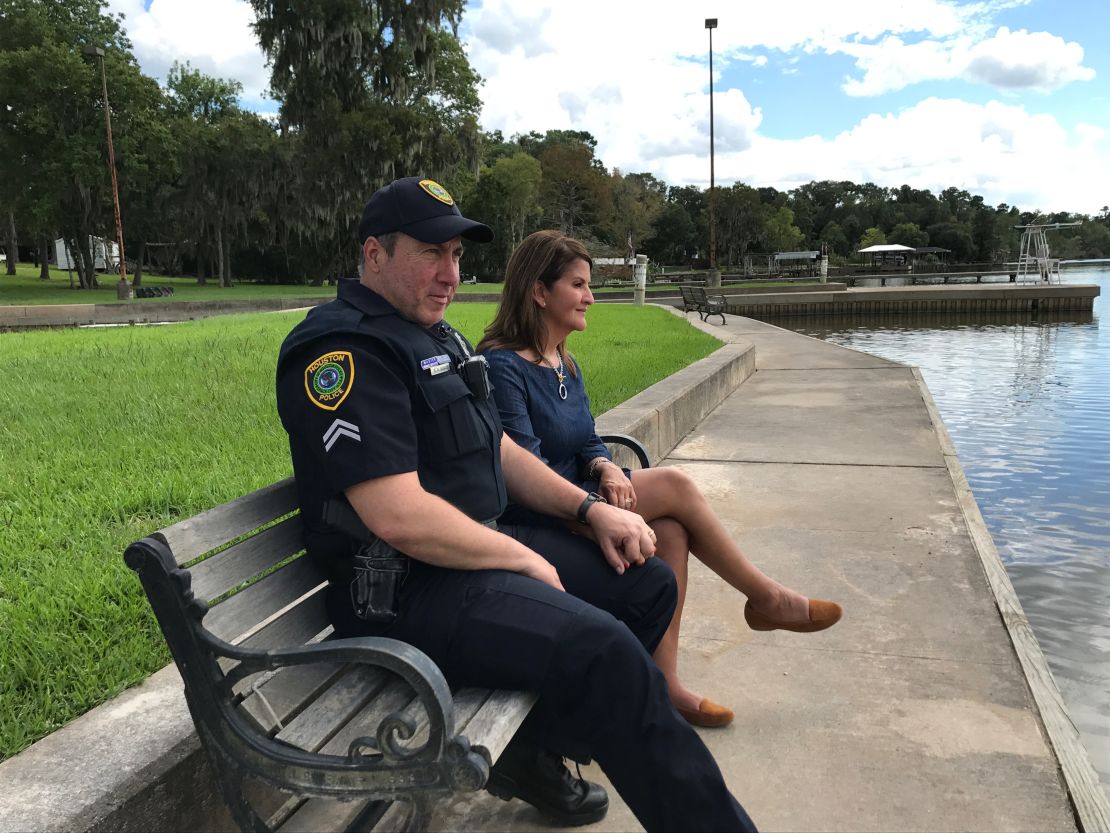 Houston Police Officer Norbert Ramón, pictured here with his wife, Cindy (right), sent her a picture of himself while in the midst of boat rescues so that she would know he was feeling fine.