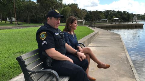 Houston Police Officer Norbert Ramón, pictured here with his wife, Cindy (right), sent her a picture of himself while in the midst of boat rescues so that she would know he was feeling fine.