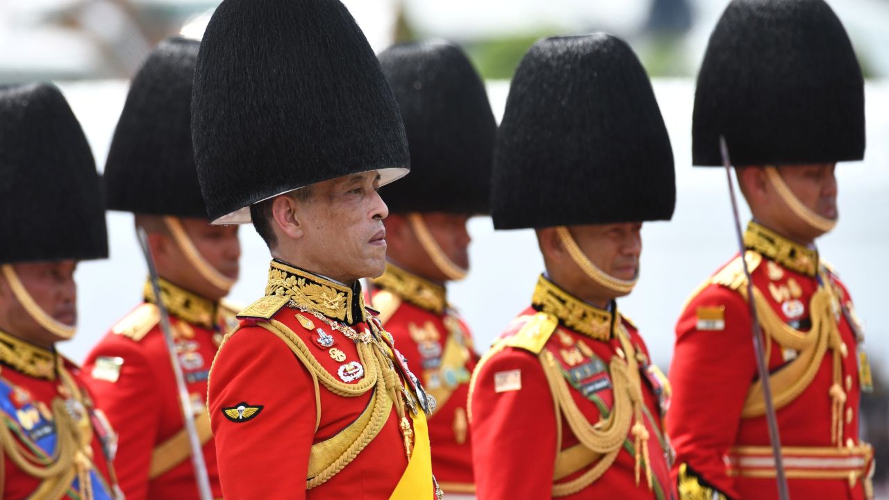 Thai King Maha Vajiralongkorn takes part in the funeral procession.