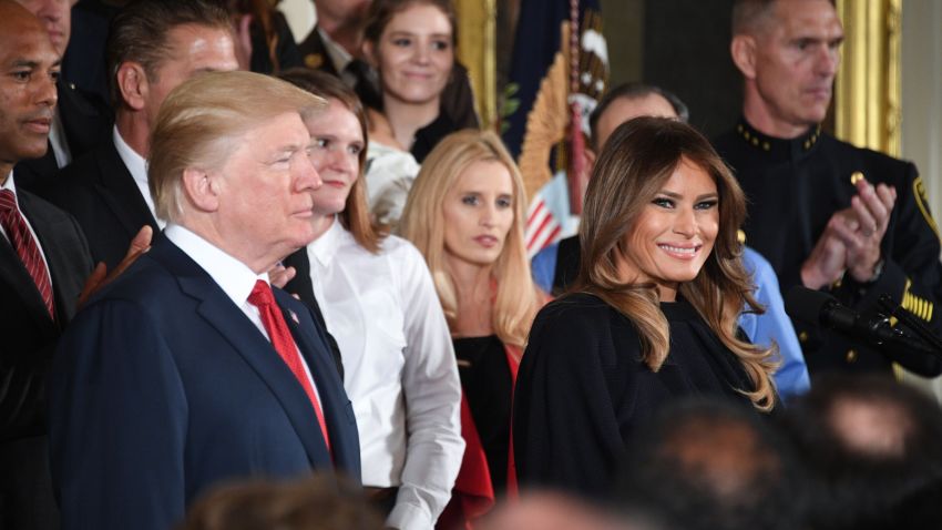 US President Donald Trump arrives with First Lady Melania Trump to deliver remarks on combatting drug demand and the opioid crisis on October 26, 2017 in the East Room of the White House in Washington, DC.
US President Donald Trump on October 26, 2017 is to declare the opioid crisis a "nationwide public health emergency," stepping up the fight against an epidemic that kills more than 100 Americans every day, officials said. / AFP PHOTO / JIM WATSON        (Photo credit should read JIM WATSON/AFP/Getty Images)