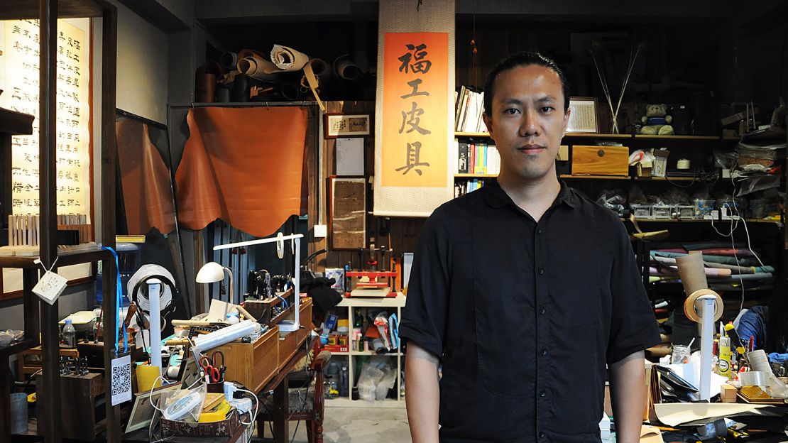 He Wei is an apprentice of China's last master of lacquer-coated leather suitcases.