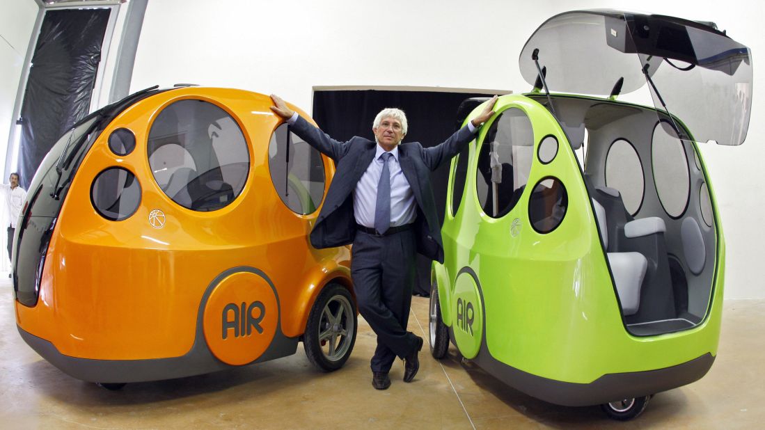 These AIRPod One prototypes are powered by compressed air, driven by joystick, and can be refilled like a gasoline car at compressed air stations. <br /><br />Plans for the AIRPod, created by Guy Negre (pictured) head of MDI, have been in the works for two decades, and it is expected to be on the market later this year. 