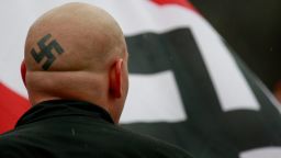 SKOKIE, IL - APRIL 19:  Neo-Nazi protestors organized by the National Socialist Movement demonstrate near where the grand opening ceremonies were held for the Illinois Holocaust Museum & Education Center April 19, 2009 in Skokie, Illinois. About 20 protestors greeted those who left the event with white power salutes and chants.  (Photo by Scott Olson/Getty Images)