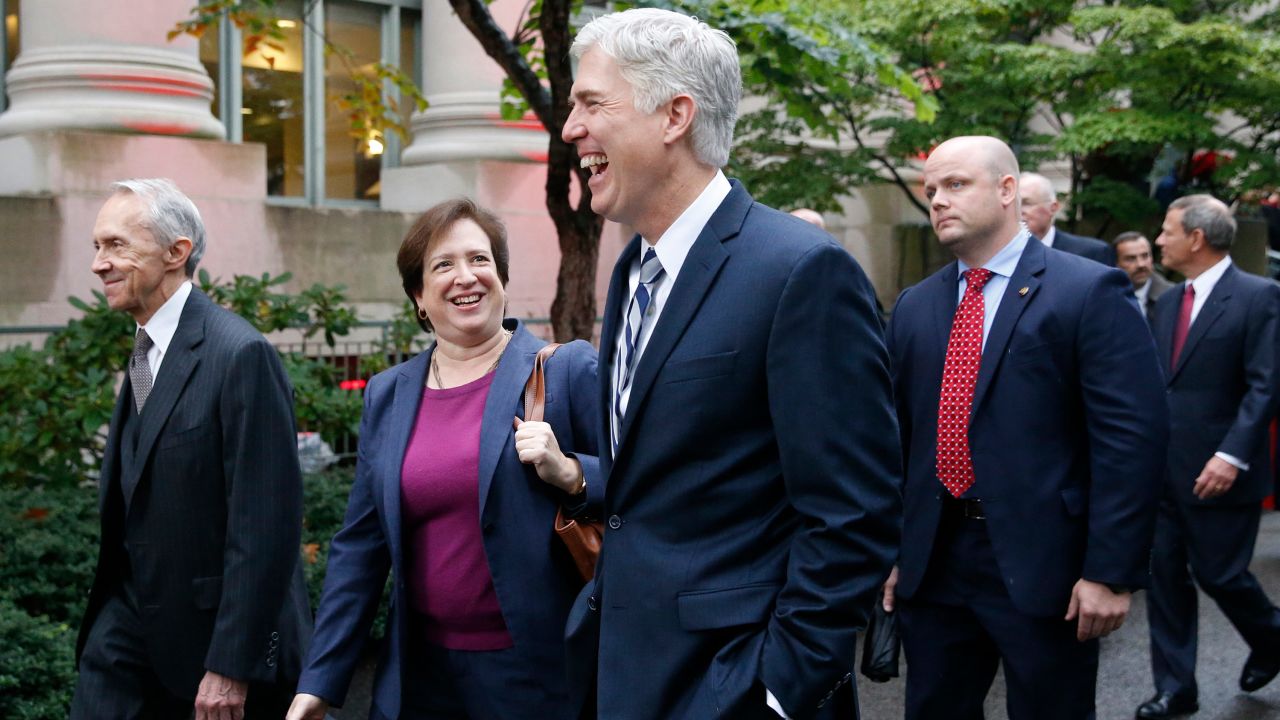 Retired Supreme Court Justice David Souter, left, walks beside Supreme Court Justice Elena Kagan, center, as she and Supreme Court Justice Neil Gorsuch share a laugh together during a procession to mark Harvard Law School's bicentennial in Cambridge, Massachusetts, on October 26, 2017. 