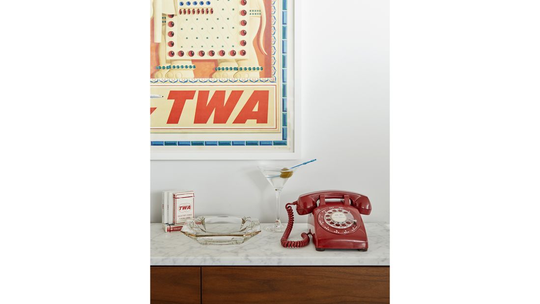 <strong>Living museum:</strong> The lounge is kitted out with remarkable vintage touches -- including this vintage rotary phone, martini glass and ashtray.