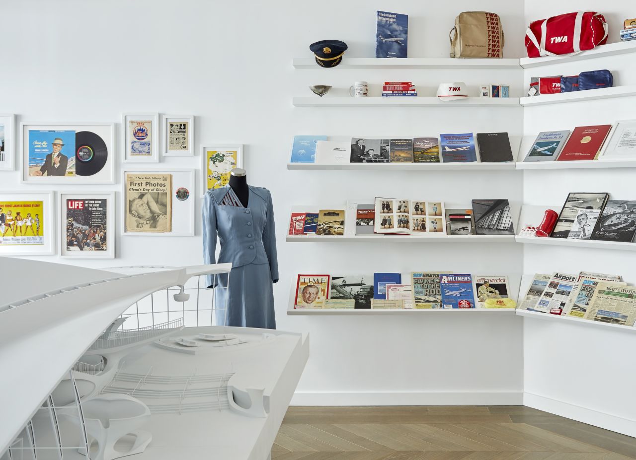 <strong>Seminal collection</strong>: The lounge also hosts a TWA collection featuring design and branding literature, vintage fight objects, the recognizable uniforms and a scaled model of the original TWA flight center.