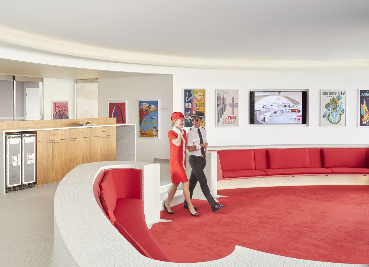 <strong>Golden age of flying:</strong> In the meantime, TWA is offering a sneak preview of what to expect from the hotel at the new TWA lounge on the 86th floor of One World Trade Center. It's a stunning, red-hued dream space -- a fantastic flashback to the golden age of flying.
