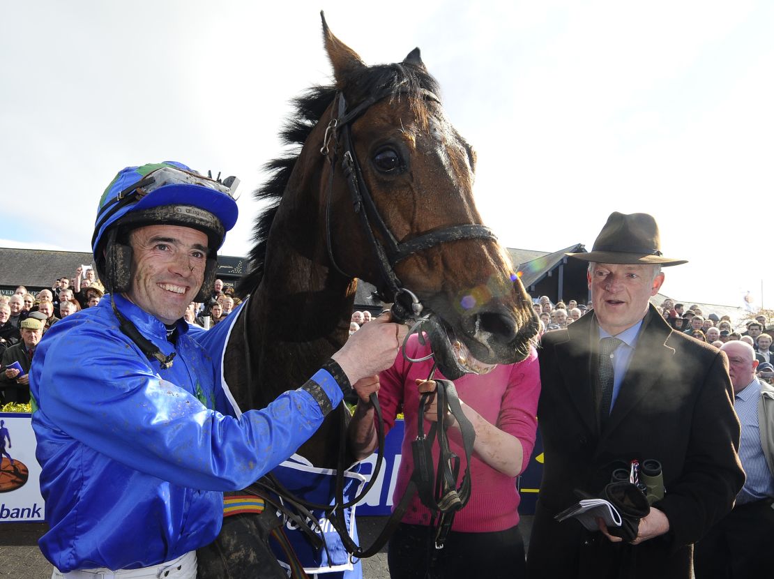 Mullins (right) has been crowned Irish national hunt champion trainer 11 times