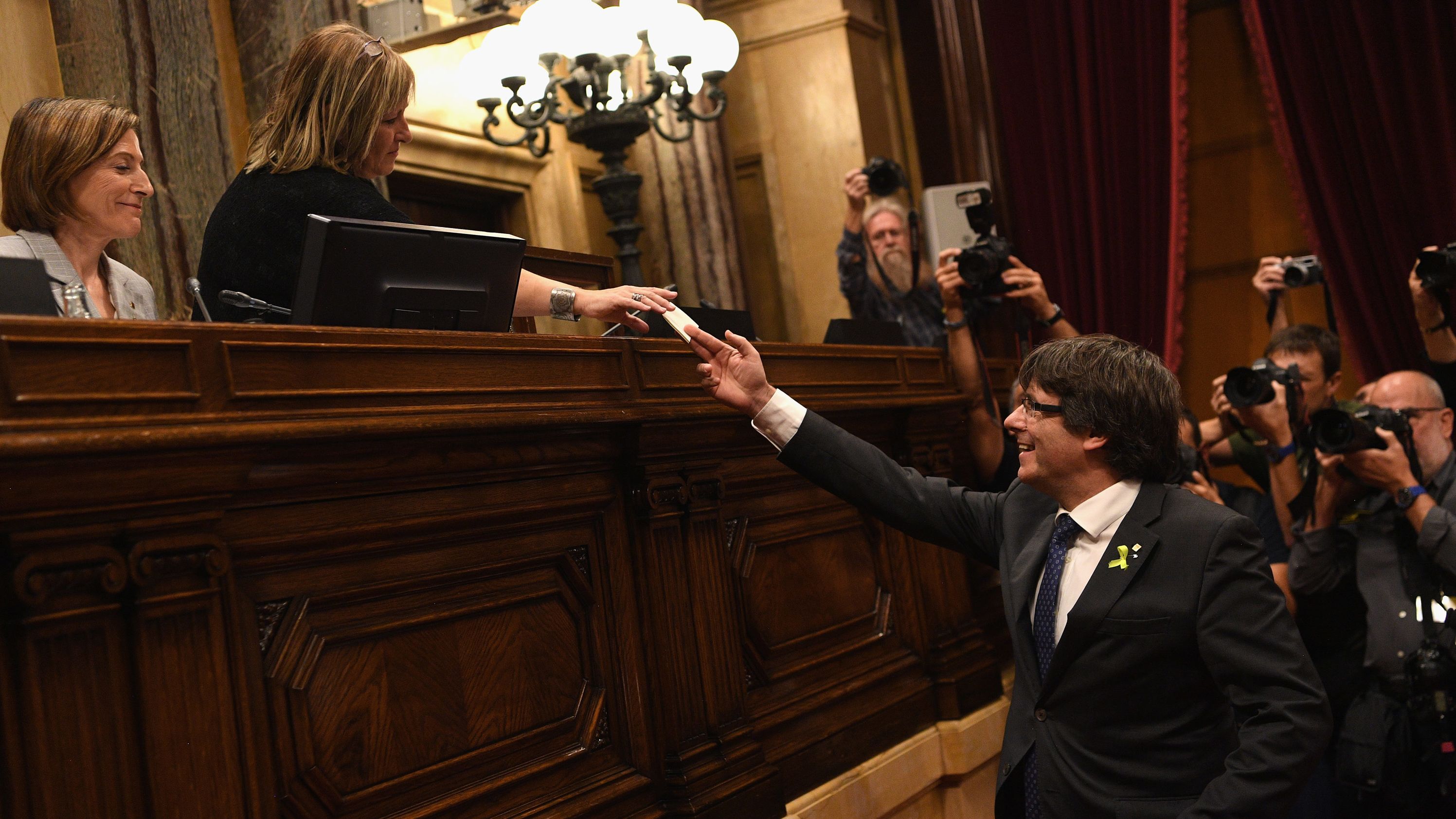 Catalan President Carles Puigdemont casts his vote for independence from Spain on Friday.
 