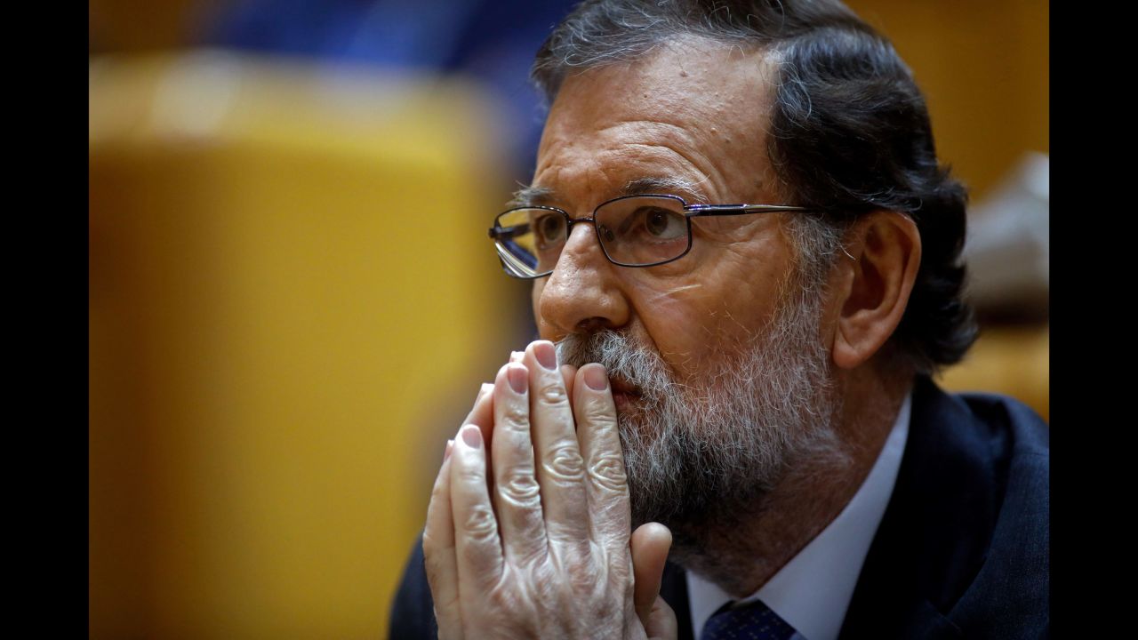 Spanish Prime Minister Mariano Rajoy attends a session of the Spanish Senate in Madrid. Rajoy asked the Senate for the go-ahead to depose Catalan leader Carles Puigdemont and his executive in a bid to stop their independence drive. 